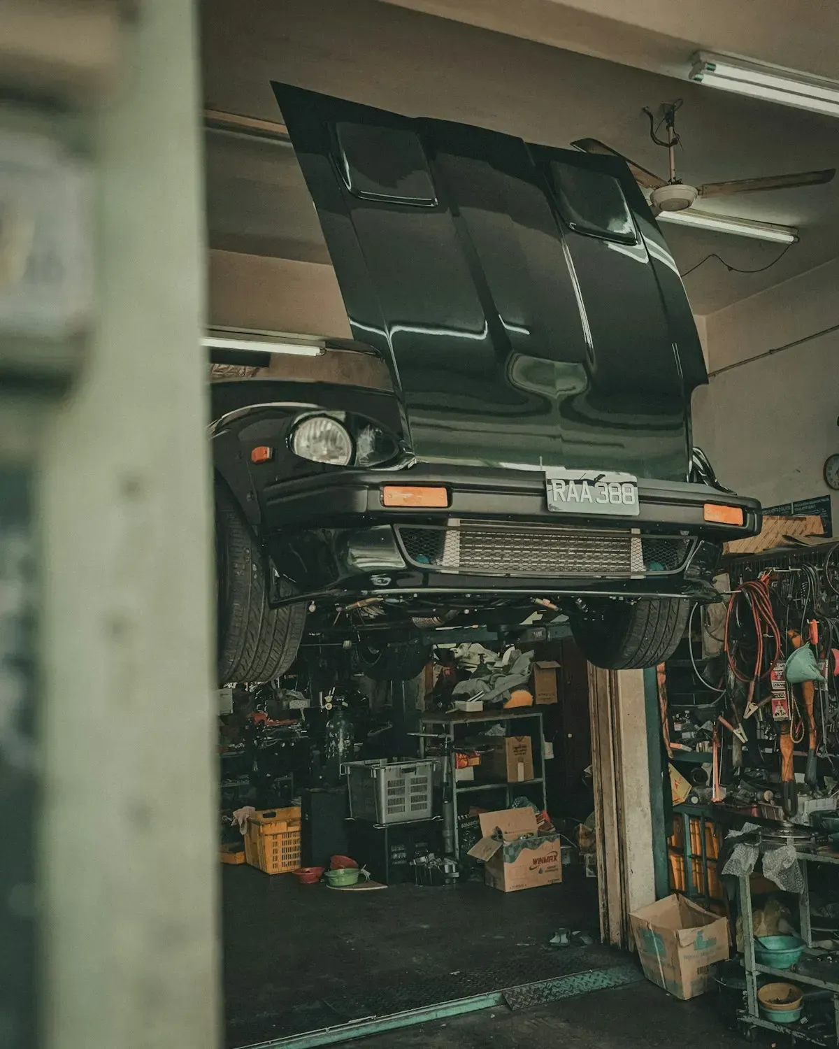 Checking the underside of a car on a lift